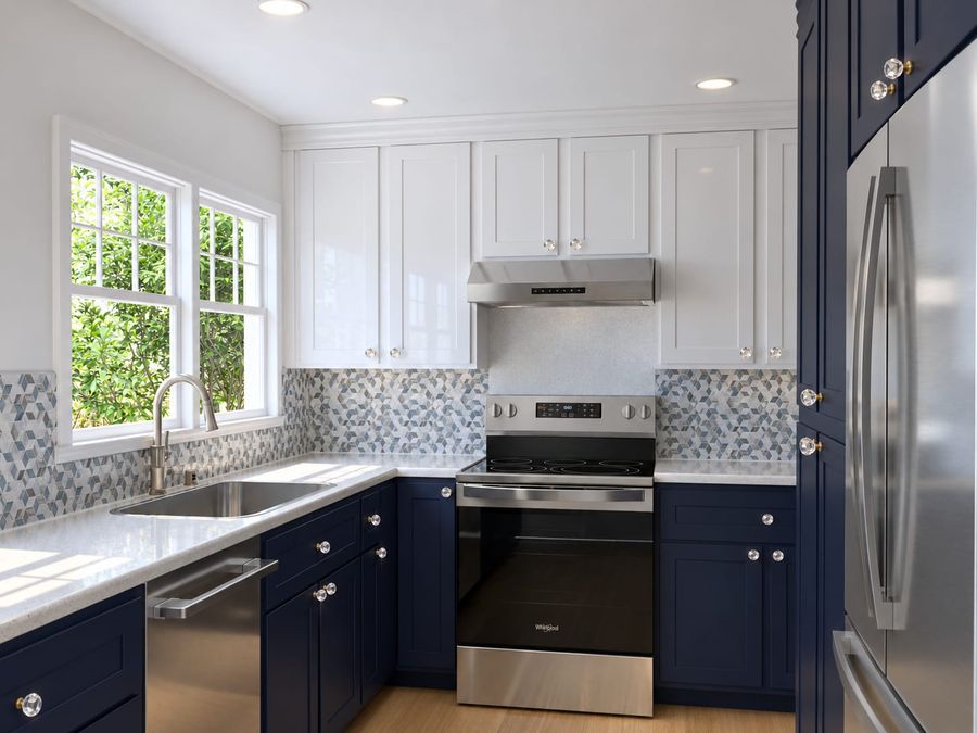 3D rendering of the same kitchen looking toward the range: navy lower cabinets, white upper cabinets, crystal knobs, the geometric mosaic backsplash, and a double window over the sink